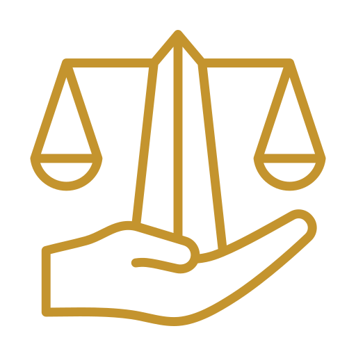 A gold outline of a hand holding an upright scale, symbolizing justice, fairness, and protection, on a light gray background.